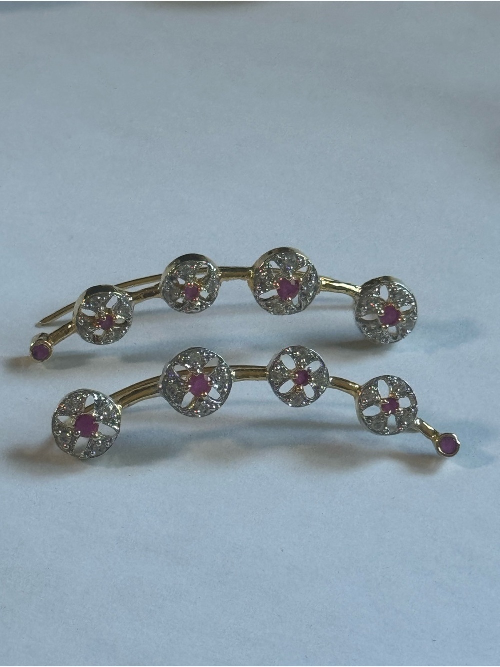 Ear climber earrings. Gold tone with clear and coloured stones. Untested